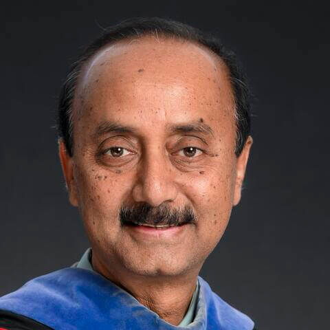 Dr. Habib Headshot DarkGreyBackground