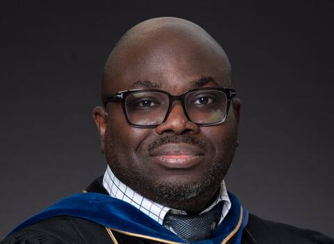 Dr. Adesina