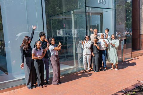 group of students in front of building 
